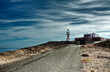 road that takes us to the beautiful lighthouse of the town of Arinaga on the island of Gran Canaria Spain