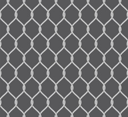 Wall Mural - Vector seamless texture of intertwined nautical ropes forming a net. Grey background.