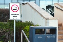 A Designated Outdoor Smoking Area Outside An Office Block