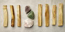 Holy Wood (Palo Santo) Incense In Row And Healing Crystals: Aventurine, Rose Quartz And Amethyst.