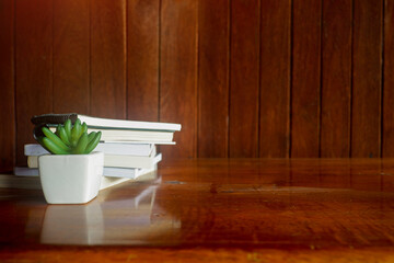 Fototapete - Cropped shot view of wood office desk table with the cup of coffee,office equipments, and other office supplies on the modern space, flat lay.