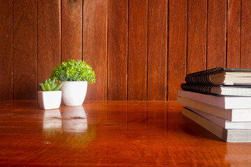 Fototapete - Cropped shot view of wood office desk table with the cup of coffee,office equipments, and other office supplies on the modern space, flat lay.
