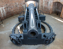 A Large Cannon (Armstrong Cannon) Inside A Hidden Building For Coastal Defense,Thailand