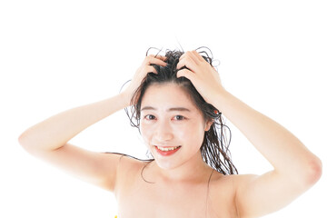 Young woman washing her hair