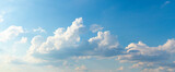 White curly clouds in the blue sky in sunny weather