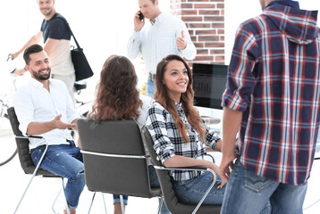 Canvas Print - woman designer talking with a colleague