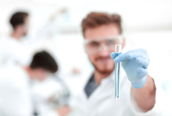 Wall Mural - closeup. scientist with beaker