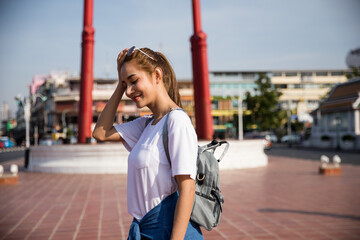 Wall Mural - Young asian lady backpacker