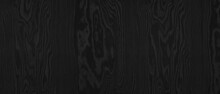 Black Wood Grain Widescreen Texture. Dark Grey Plywood Wide Wallpaper. Wooden Surface Pattern Abstract Textured Background