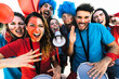 © Alessandro Biascioli - Football fans watching soccer match event at stadium - Young people having fun supporting favorite club - Sport entertainment concept