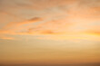 © Eve - Abstract clouds in the gloden sky during sunset for background.
