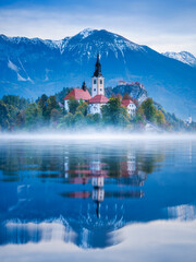 Wall Mural - lake bled in slovenia. church on an island in the middle of the lake. autumn landscape at dawn. larg