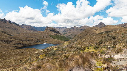 Wall Mural - Cajas National Park on sunny day. Patoquinoas Lagoon (Lake) and view of mountain Avilahuayco. South America, Ecuador, Azuay province close to Cuenca