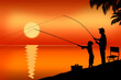 Father's Day. Father and son are fishing at sunset.