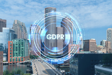 Panorama city view of Boston Harbour at day time, Massachusetts. Building exteriors of financial downtown. GDPR hologram is data protection regulation and privacy for all individuals within EU Area