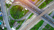 4K : Top View Of Highway Road Junctions. The Intersection Freeway Road Overpass The Eastern Outer Ring Road. Aerial View From A Drone. Nonthaburi, Thailand.
