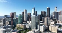 Skyscrapers Of Los Angeles Downtown, Fly LA By Drone, Top Aerial View. Los Angels City Center. Los Angeles, CA, USA, May 10, 2022.
