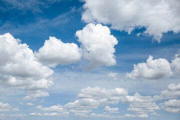 Wall Mural - white, fluffy clouds in blue sky. background from clouds