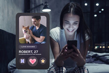 Smiling woman in pajama sitting on bed liking profile of man in dating app on phone
