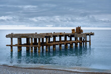 View Of The Old Abandoned Pier In The Sea