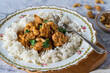 Chicken korma curry with cashew nuts and rice