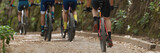 Fototapeta Kawa jest smaczna - Mountain bikers riding on bike singletrack trail, mountain bike race