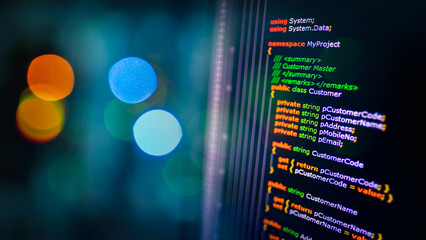 Leinwandbilder - C sharp programming language source code example on monitor and bokeh background., C# source code.