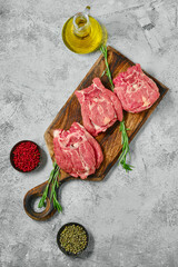 Wall Mural - Raw lamb neck cut on slices on cutting board