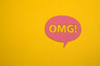 speech bubble with omg word on yellow background