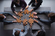 © alotofpeople - Business teamwork with puzzle