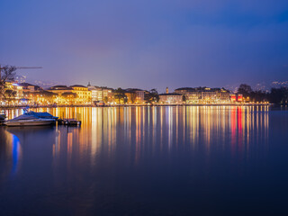 Wall Mural - Lugano city on the lake illuminated at night in Switzerland