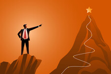 Businessman Hand On Waist Standing On Cliffs While Pointing To A Golden Star On Mountain Peak