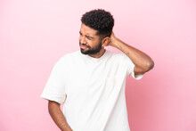 Young Brazilian Man Isolated On Pink Background With Neckache