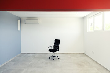 Poster - empty business room with blak chair