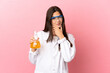 © luismolinero - Young scientific girl over isolated pink background thinking