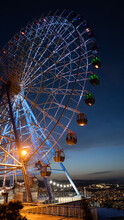 Famous Ferris Wheel In Mtatsminda Amusement Park In Tbilisi, Georgia. Illuminated Giant Wheel At Night. Entertainment Concept