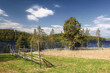 © jojoo64 - Rural field, fence and shack in the village Gallejaur in northern Sweden