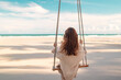 © oatawa - Freedom young resting woman enjoying feel, female sitting on swings near sea beach in sunshine. Summer relax.
