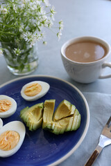 Wall Mural - Breakfast with egg and avocado