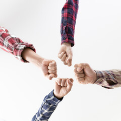 Wall Mural - young business people putting their hands together