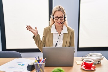 Sticker - Young caucasian woman working wearing call center agent headset celebrating achievement with happy smile and winner expression with raised hand