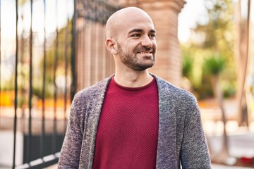 Poster - Young man smiling confident standing at street