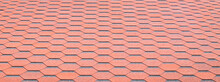 New Roof With Red Shingles. Tiles On The Roof Of The House. Use To Advertise Roof Fabrication And Maintenance. Spotted Texture. Affordable Roofing. Banner With Copy Space.