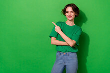 Photo Of Confident Pretty Lady Wear Spring Outfit Pointing Empty Space Smiling Isolated Green Color Background