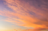Fototapeta Desenie - Sunset sky with orange sunrise on blue sky background in the morning.