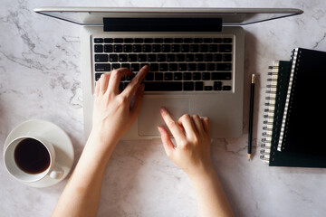 Fototapete - Cropped shot view of business woman’s hands typing the labtop with blank copy space screen for your information content or text message.