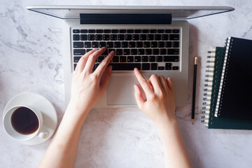 Fototapete - Cropped shot view of business woman’s hands typing the labtop with blank copy space screen for your information content or text message.
