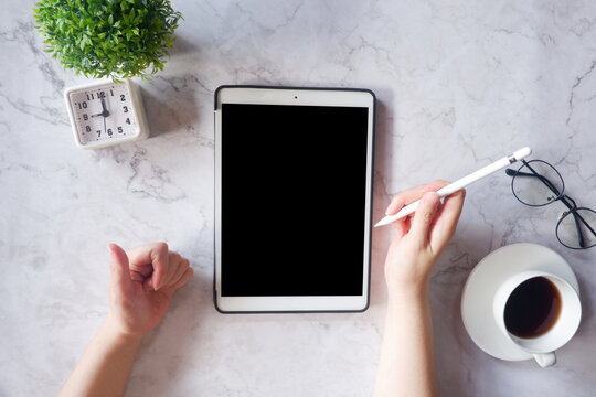 Cropped shot view of business woman’s hands typing the labtop with blank copy space screen for your information content or text message.