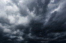 The Dark Sky With Heavy Clouds Converging And A Violent Storm Before The Rain.Bad Or Moody Weather Sky..