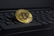 Bitcoin crypto gold coin on laptop business trading